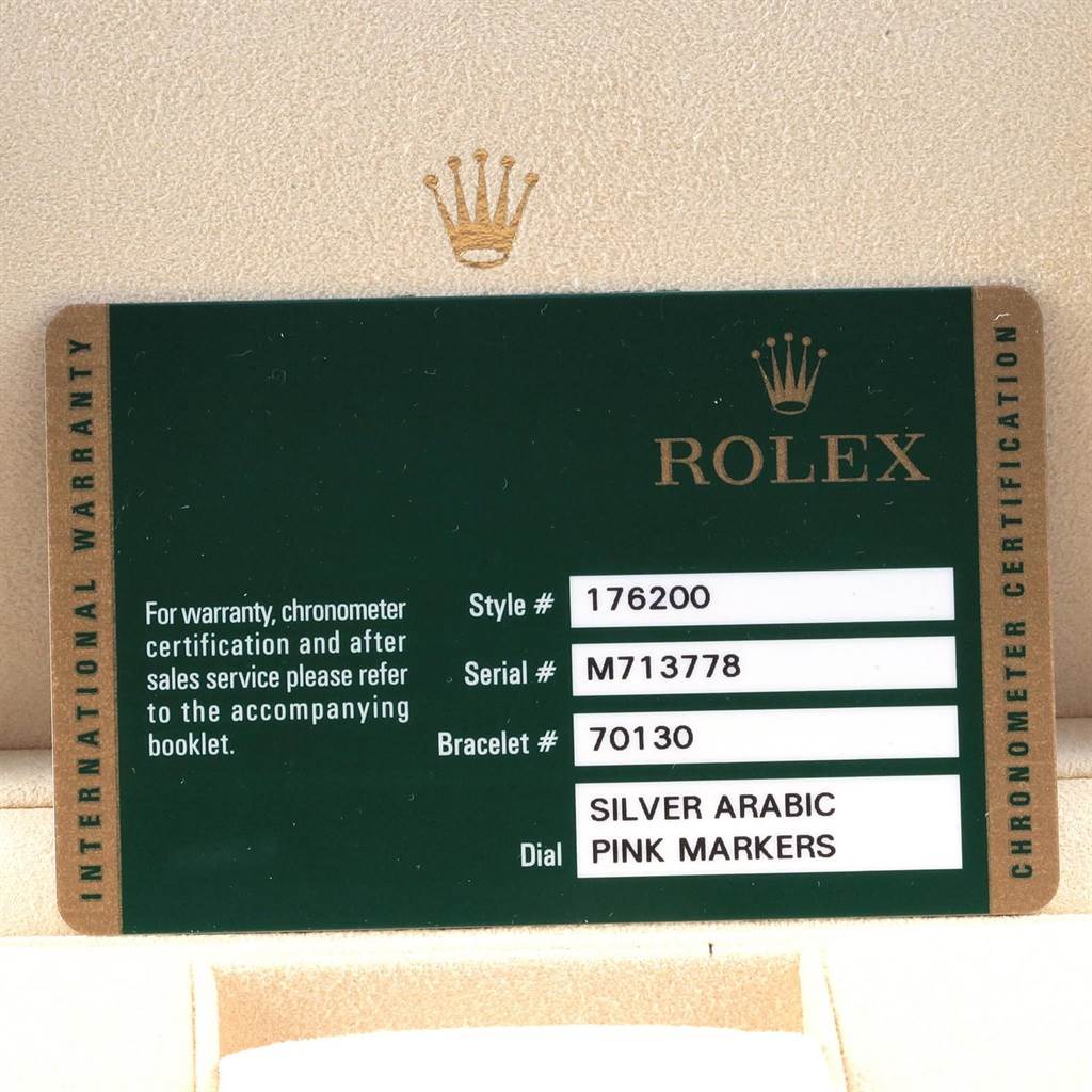 The image shows an international warranty card for a Rolex Oyster Perpetual 176200 Women's Stainless Steel Silver Dial 176200 Women's Stainless Steel Silver Dial model with details on style, serial, and bracelet numbers.