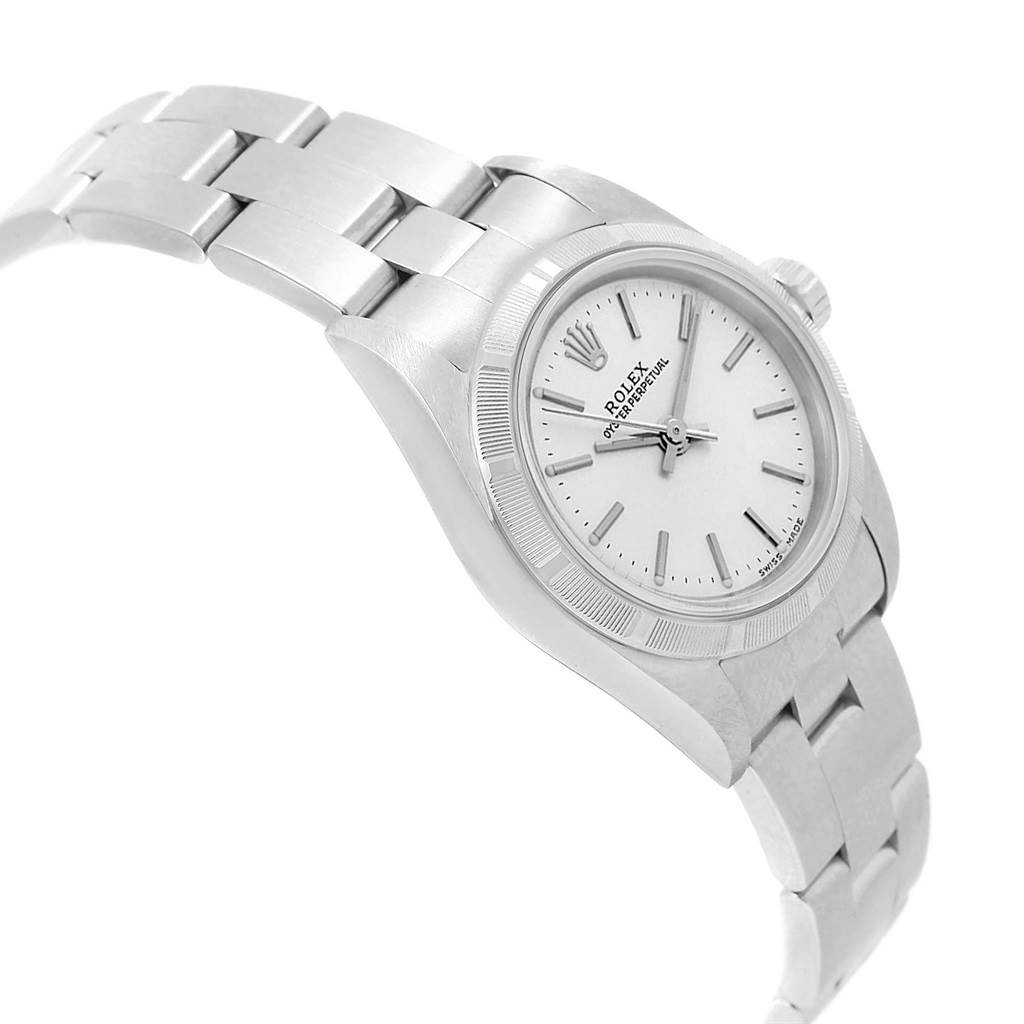 This image displays a Rolex Oyster Perpetual 76030 Women
s Stainless Steel Silver Dial 76030 Women
s Stainless Steel Silver Dial watch at an angle showing the face, bezel, and bracelet.