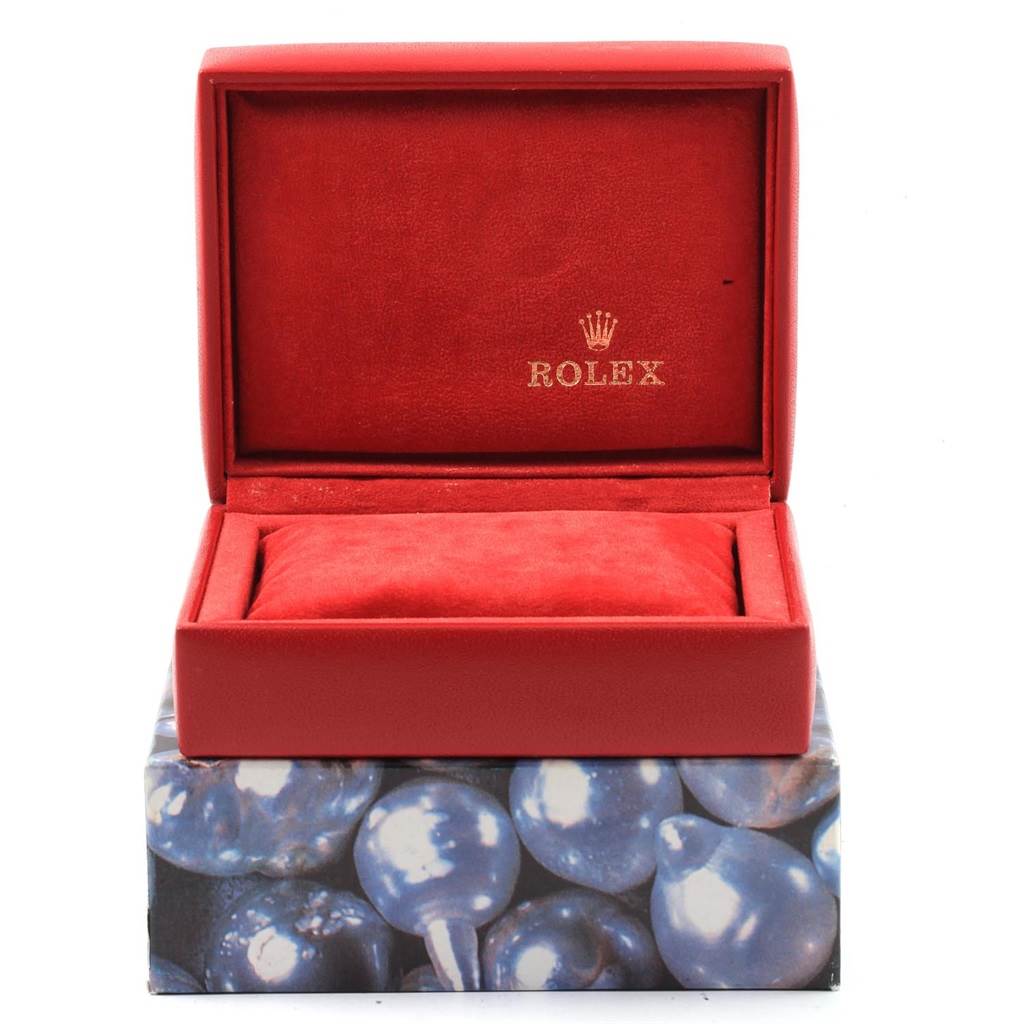 This image shows the Rolex Oyster Perpetual 67193 Women
s Steel and Gold (two tone) Silver Dial 67193 Women
s Steel and Gold (two tone) Silver Dial watch box, presented from the front with the lid open.