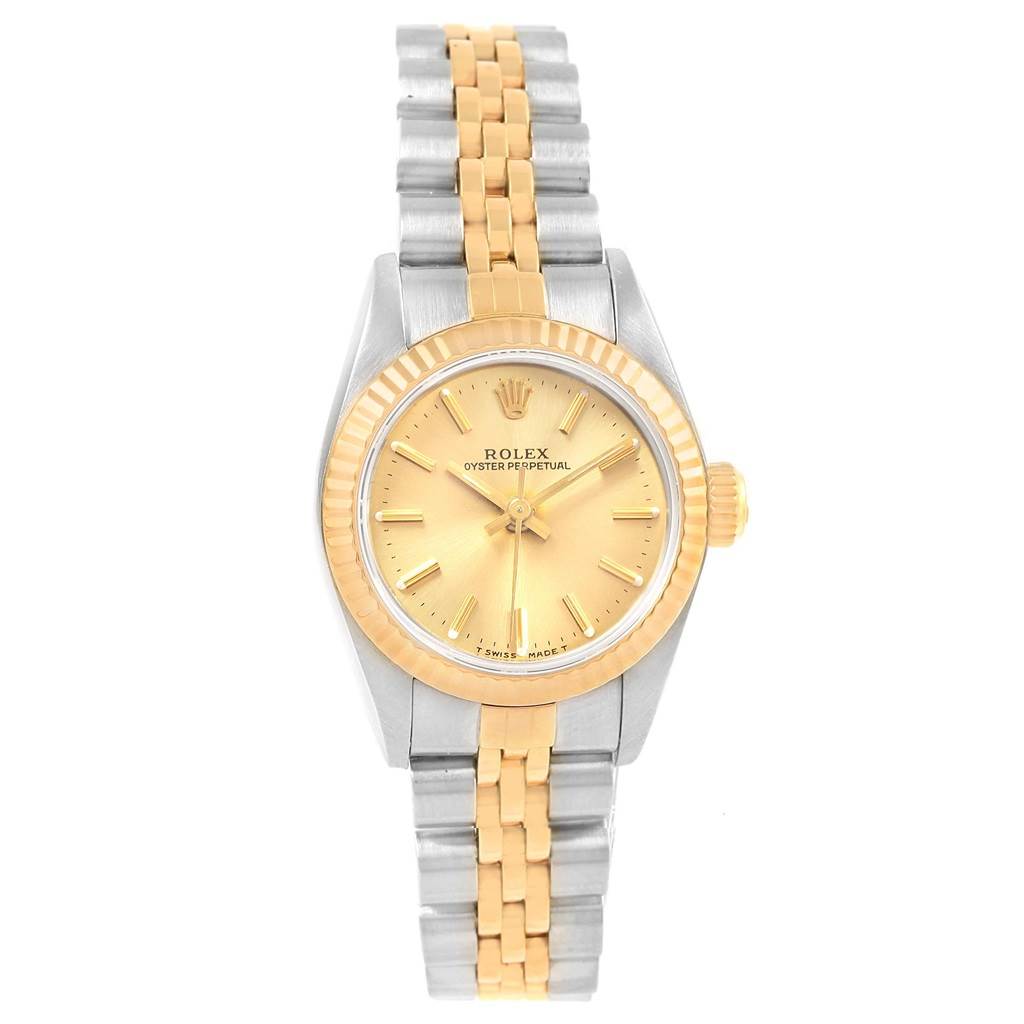 This image shows a Rolex Oyster Perpetual 67193 Women's Steel and Gold (two tone) Champagne Dial 67193 Women's Steel and Gold (two tone) Champagne Dial watch from a frontal angle, highlighting its two-tone bracelet and gold dial.