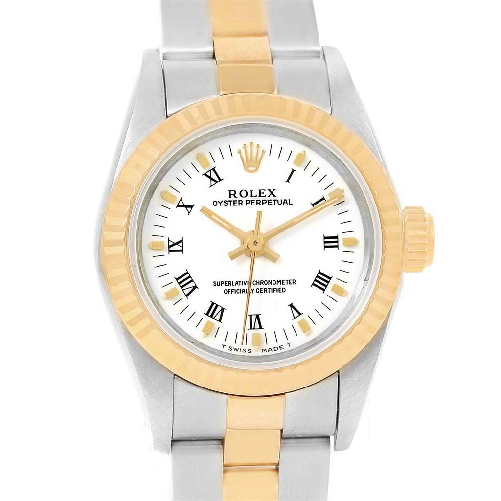 This image shows a front view of a Rolex Oyster Perpetual 67193 Women's Steel and Gold (two tone) White Dial 67193 Women's Steel and Gold (two tone) White Dial watch, highlighting the dial, bezel, and part of the bracelet.