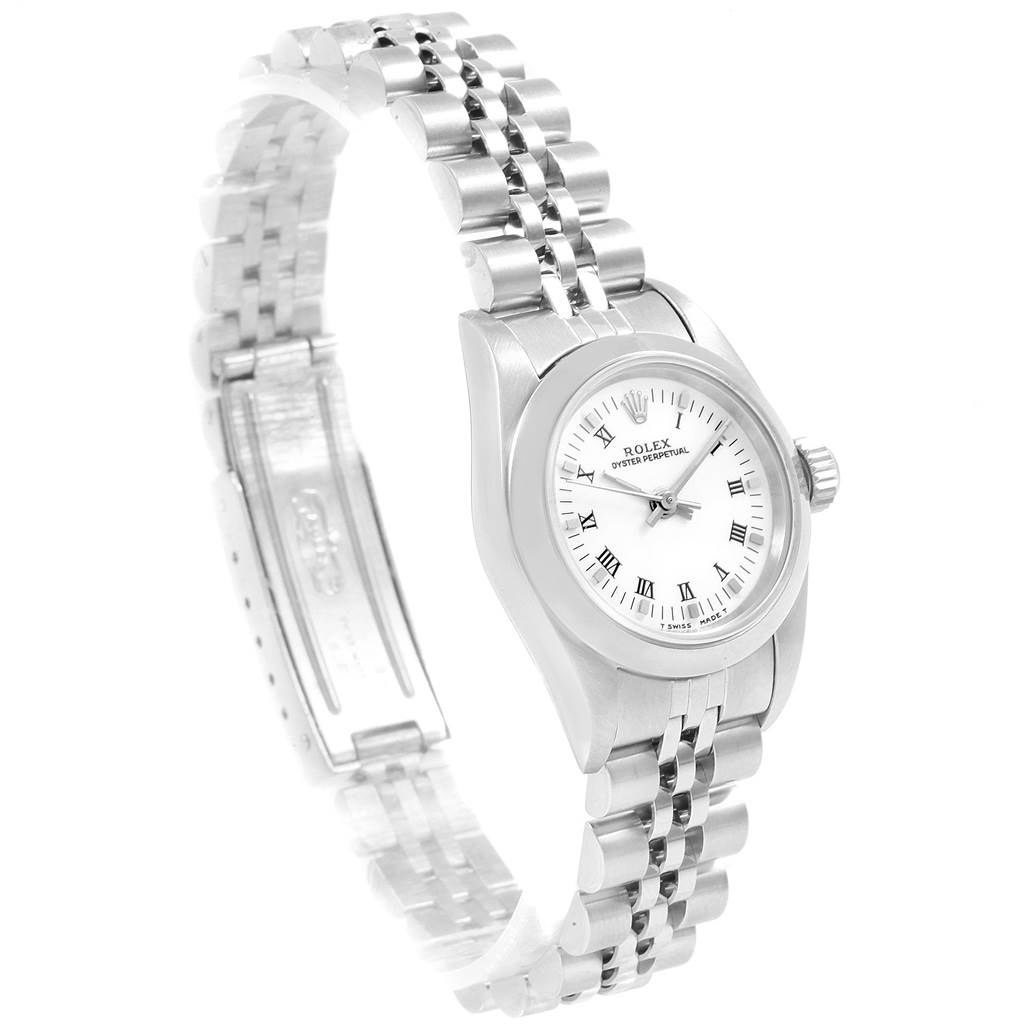 The image shows a Rolex Oyster Perpetual 67180 Women's Stainless Steel White Dial 67180 Women's Stainless Steel White Dial watch at an angled side view, displaying the face, bezel, and partially extended bracelet.