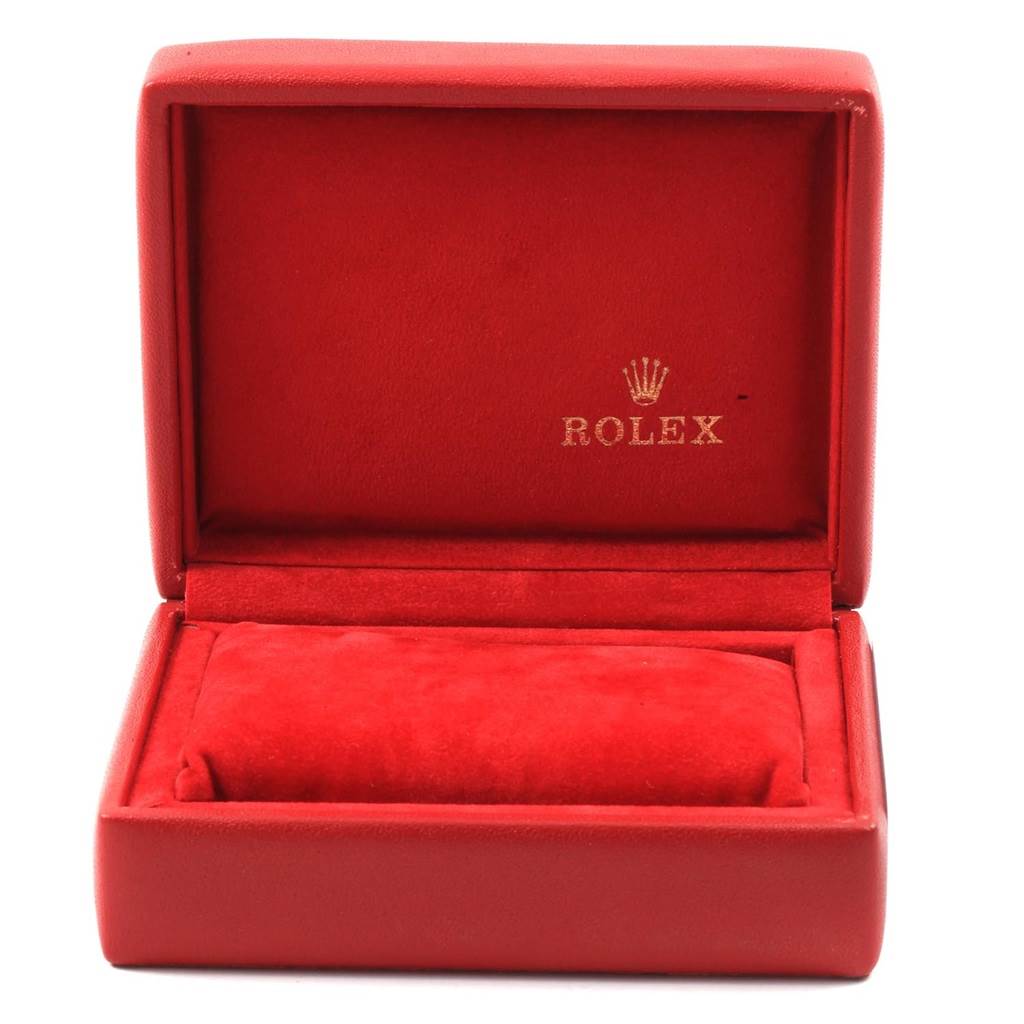 This is an empty Rolex watch box, likely for the Oyster Perpetual model, displayed open with red interior and exterior.