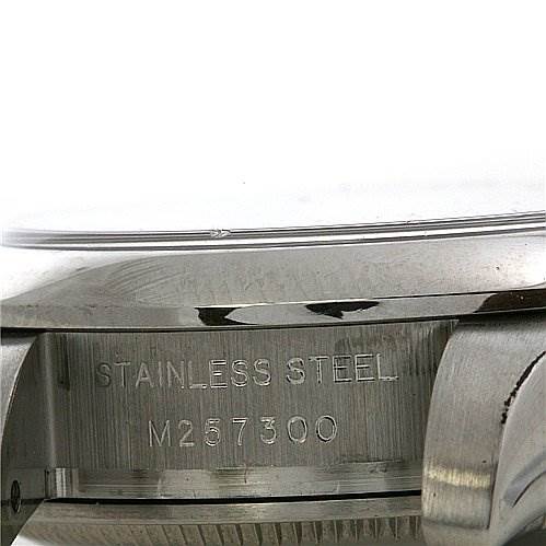 The image shows a close-up of the case back and side of a Rolex Oyster Perpetual 176200 Women's Stainless Steel Black Dial 176200 Women's Stainless Steel Black Dial, highlighting the "STAINLESS STEEL" and model number engraving.