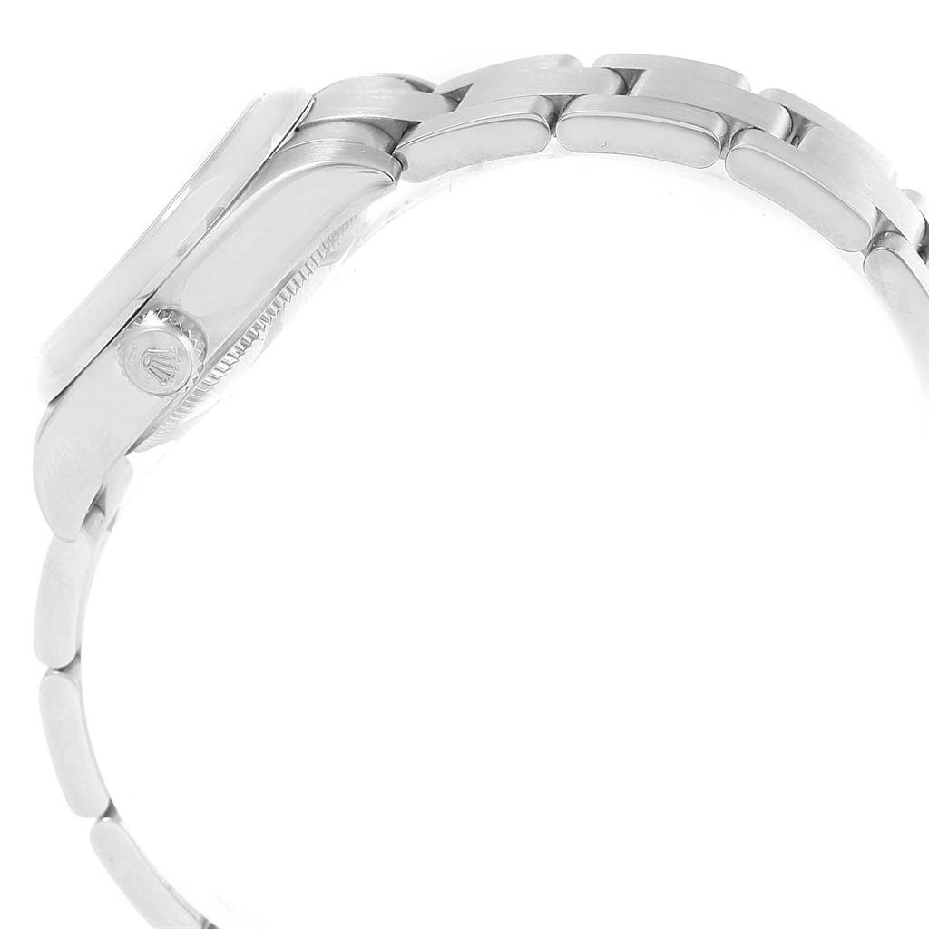 The image shows a side view of a Rolex Oyster Perpetual 176200 Women
s Stainless Steel Silver Dial 176200 Women
s Stainless Steel Silver Dial watch, highlighting the case, crown, and part of the bracelet.