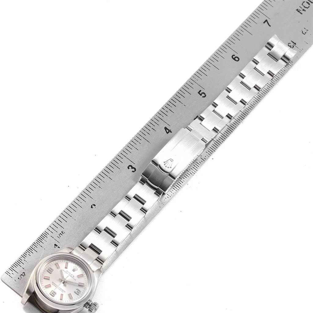 The image shows a Rolex Oyster Perpetual 176200 Women
s Stainless Steel Silver Dial 176200 Women
s Stainless Steel Silver Dial watch face and bracelet, measured against a ruler for scale.
