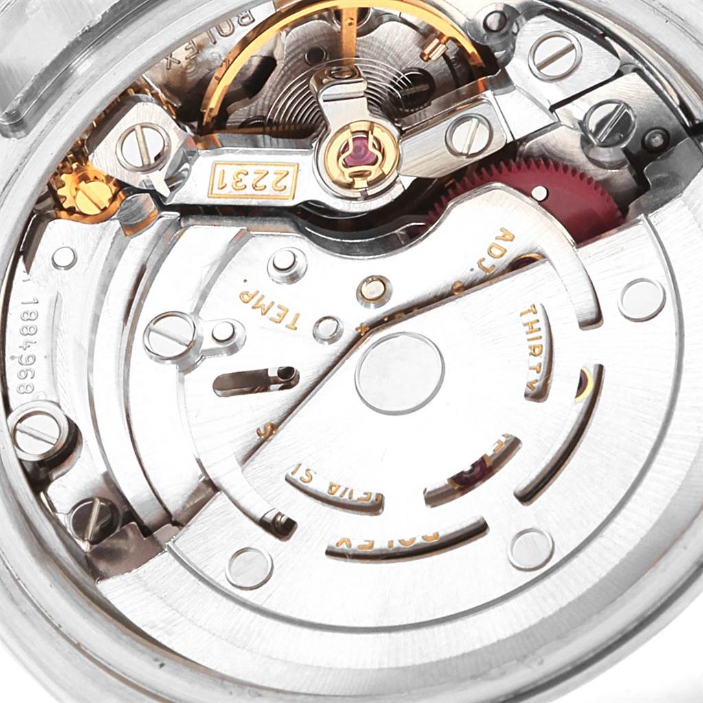 This image shows a close-up of the movement mechanism inside the Rolex Oyster Perpetual 176200 Women
s Stainless Steel Silver Dial 176200 Women
s Stainless Steel Silver Dial watch.