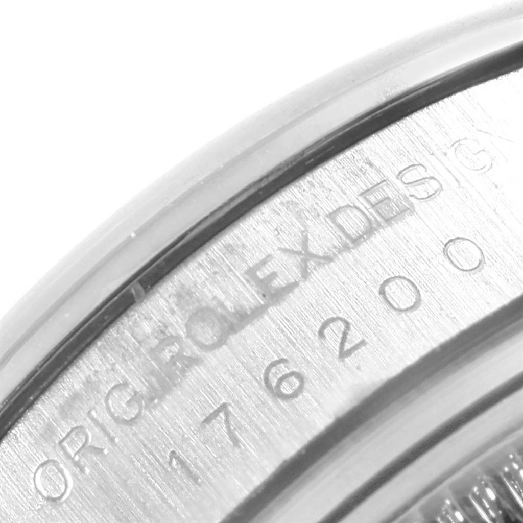 This image shows a close-up of the side and engraving of a Rolex Oyster Perpetual 176200 Women
s Stainless Steel Black Dial 176200 Women
s Stainless Steel Black Dial watch.