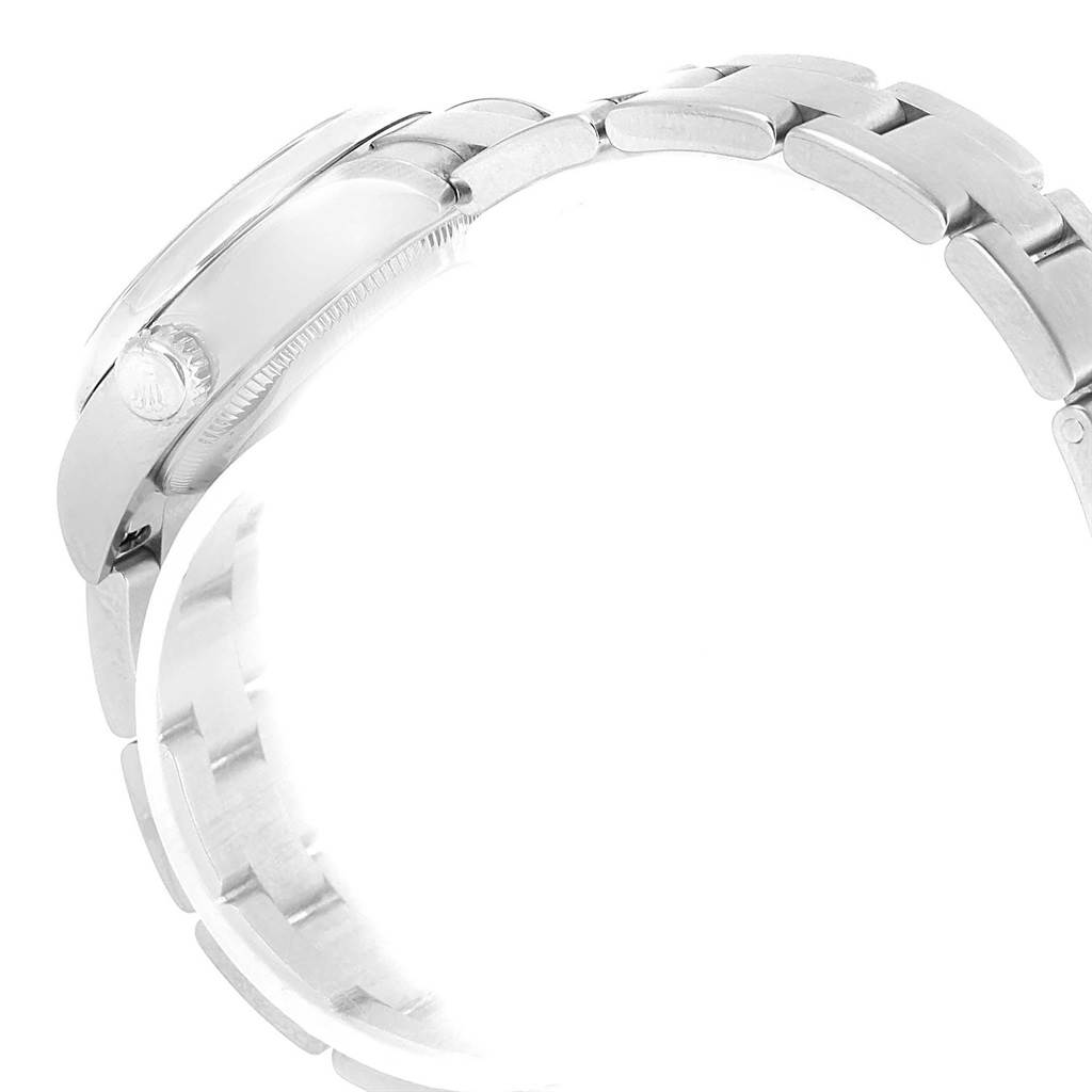 The image shows a side view of a Rolex Oyster Perpetual 176200 Women
s Stainless Steel Black Dial 176200 Women
s Stainless Steel Black Dial wristwatch, highlighting the band and the side of the watch case with the crown.