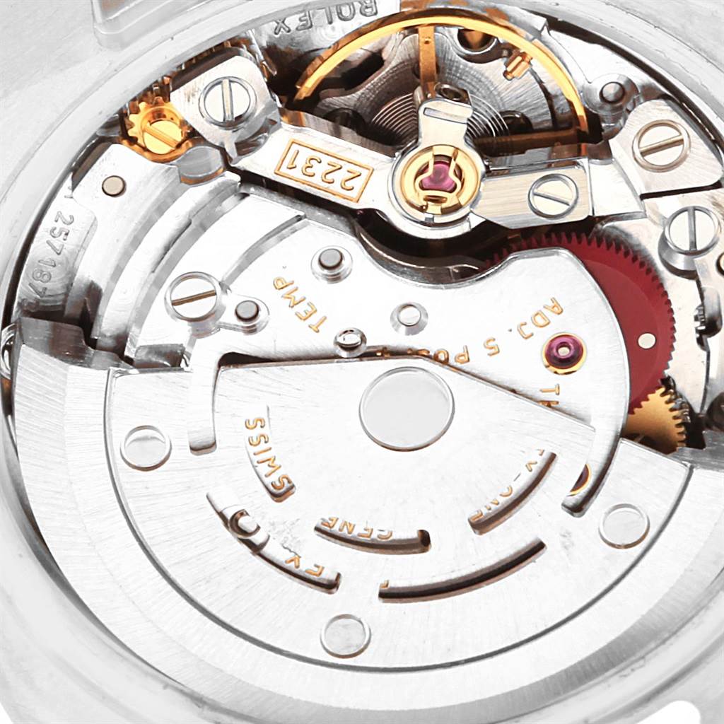 This image shows a close-up of the movement mechanism of a Rolex Oyster Perpetual 176200 Women
s Stainless Steel Black Dial 176200 Women
s Stainless Steel Black Dial watch.