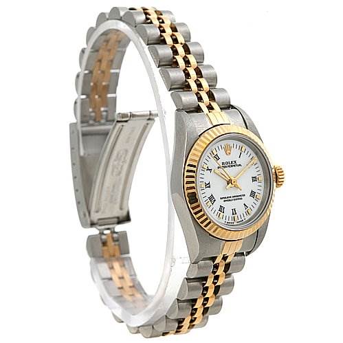 The image shows a Rolex Oyster Perpetual 67193 Women's Yellow Gold White Dial 67193 Women's Yellow Gold White Dial watch at an angle, highlighting the dial, bezel, and two-tone bracelet.