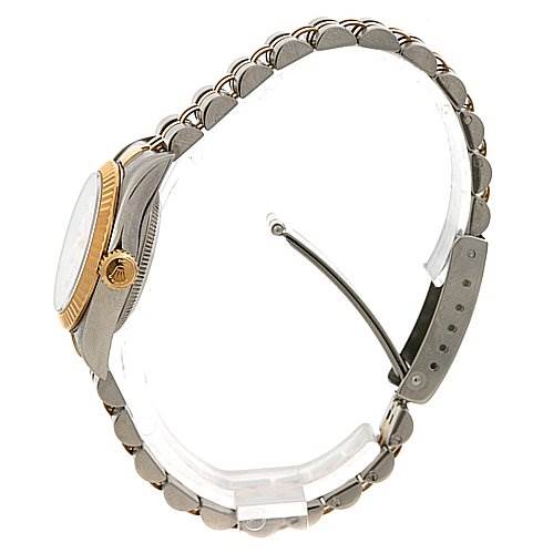 This image shows a side view of a Rolex Oyster Perpetual 67193 Women's Yellow Gold White Dial 67193 Women's Yellow Gold White Dial watch, highlighting its bracelet, clasp, case, and crown.