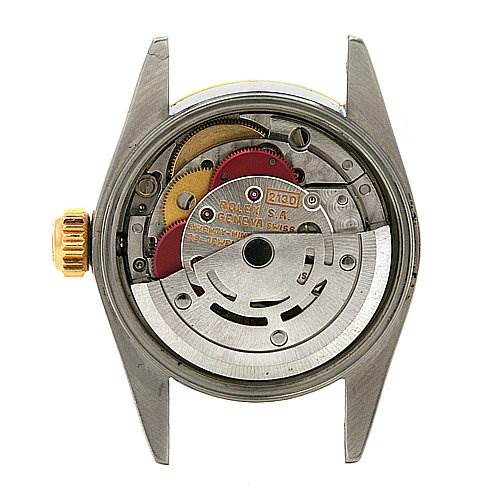 This image shows the back view of a Rolex Oyster Perpetual 67193 Women's Yellow Gold White Dial 67193 Women's Yellow Gold White Dial watch, displaying the exposed mechanical movement and components.