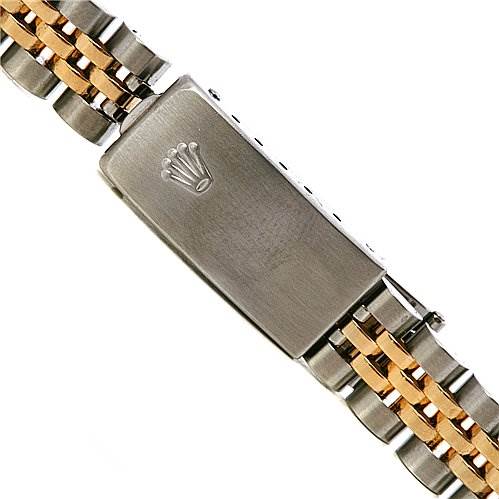 This image shows the clasp and part of the bracelet of a Rolex Oyster Perpetual 67193 Women's Yellow Gold White Dial 67193 Women's Yellow Gold White Dial watch.