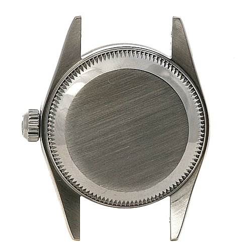This image shows the back view of the case of a Rolex Oyster Perpetual 76094 Women's Stainless Steel Black Dial 76094 Women's Stainless Steel Black Dial watch, including the lugs and crown.