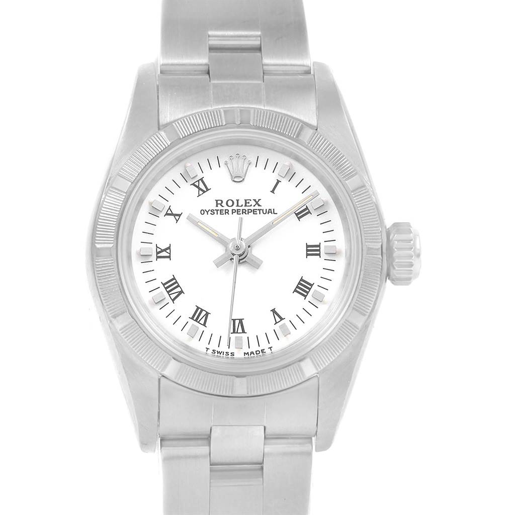The image shows a front view of a Rolex Oyster Perpetual 67230 Women's Stainless Steel White Dial 67230 Women's Stainless Steel White Dial watch, highlighting its face, bezel, and part of the bracelet.
