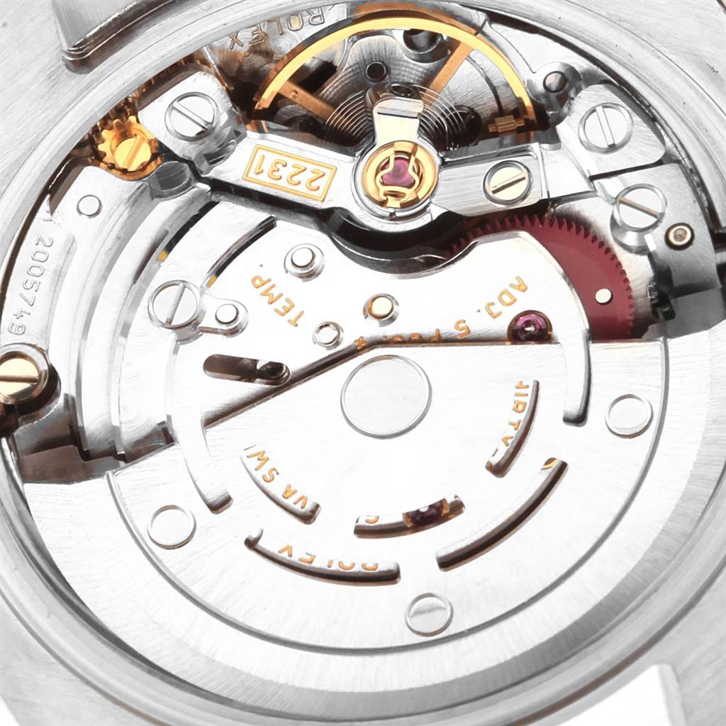 This image shows the movement mechanism of a Rolex Oyster Perpetual 176234 Women
s Stainless Steel Pink Dial 176234 Women
s Stainless Steel Pink Dial watch from a close-up top view.
