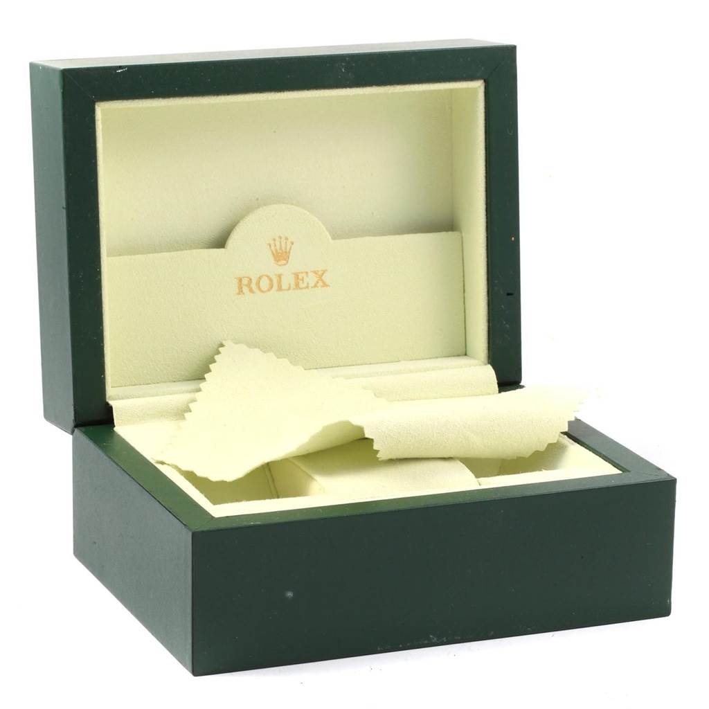 The image shows an open Rolex Oyster Perpetual 176234 Women
s Stainless Steel Pink Dial 176234 Women
s Stainless Steel Pink Dial watch box with a cleaning cloth inside.