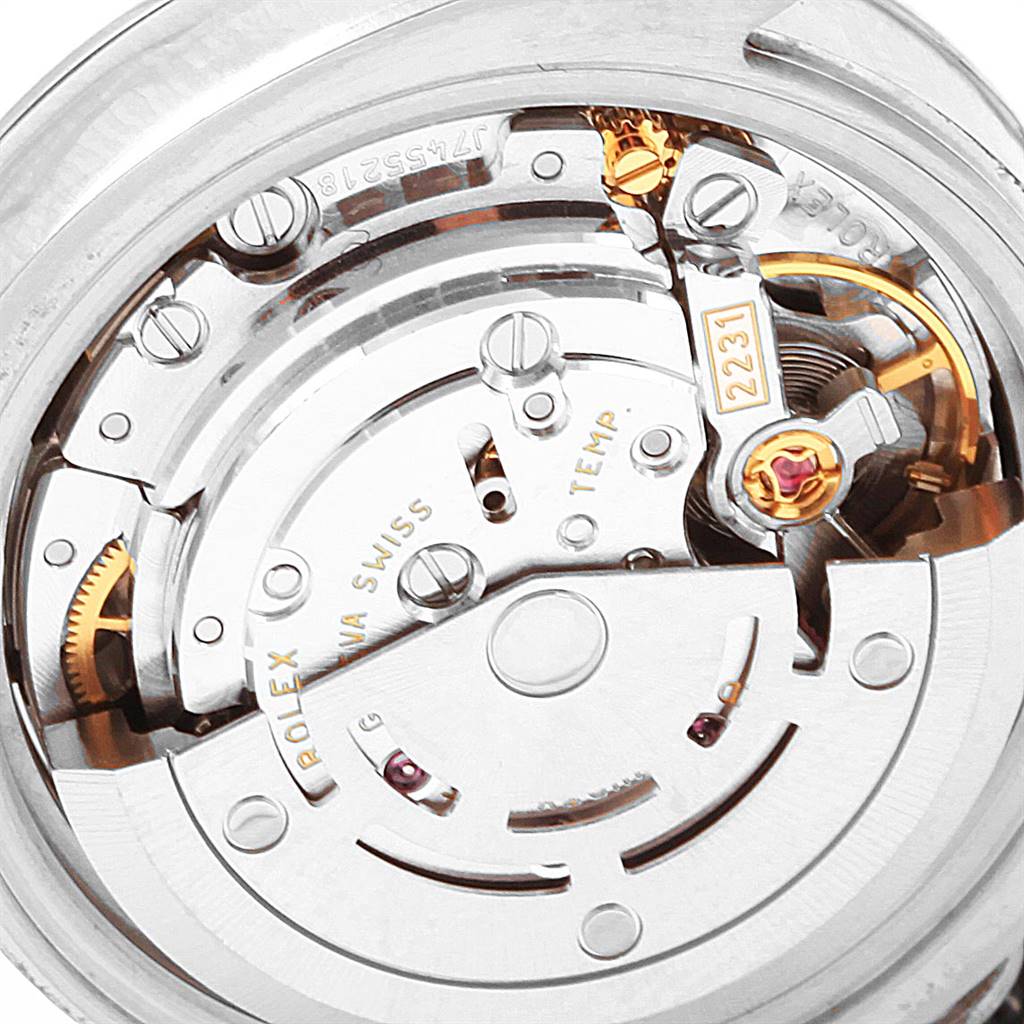 The image shows a close-up of the intricate internal mechanism of the Rolex Oyster Perpetual 176200 Women's Stainless Steel Black Dial 176200 Women's Stainless Steel Black Dial watch model.