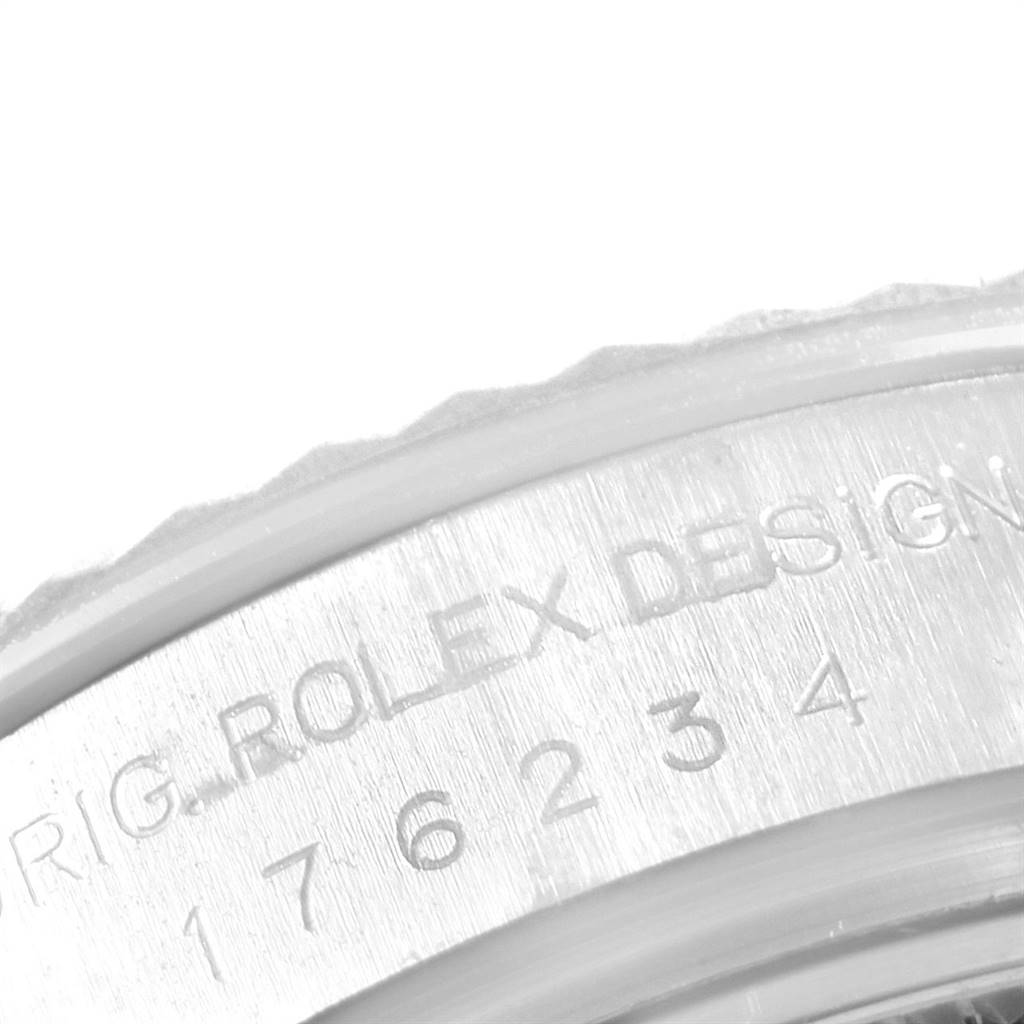The image shows a close-up of the outer rim of the Rolex Oyster Perpetual 176234 Women's Stainless Steel Silver Dial 176234 Women's Stainless Steel Silver Dial with part of the "Rolex Design" engraving visible.