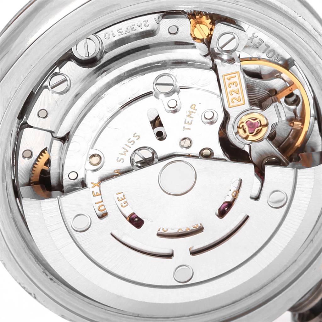 The image shows a close-up of the internal mechanics of a Rolex Oyster Perpetual 176234 Women's Stainless Steel Silver Dial 176234 Women's Stainless Steel Silver Dial watch, focusing on its movement components.