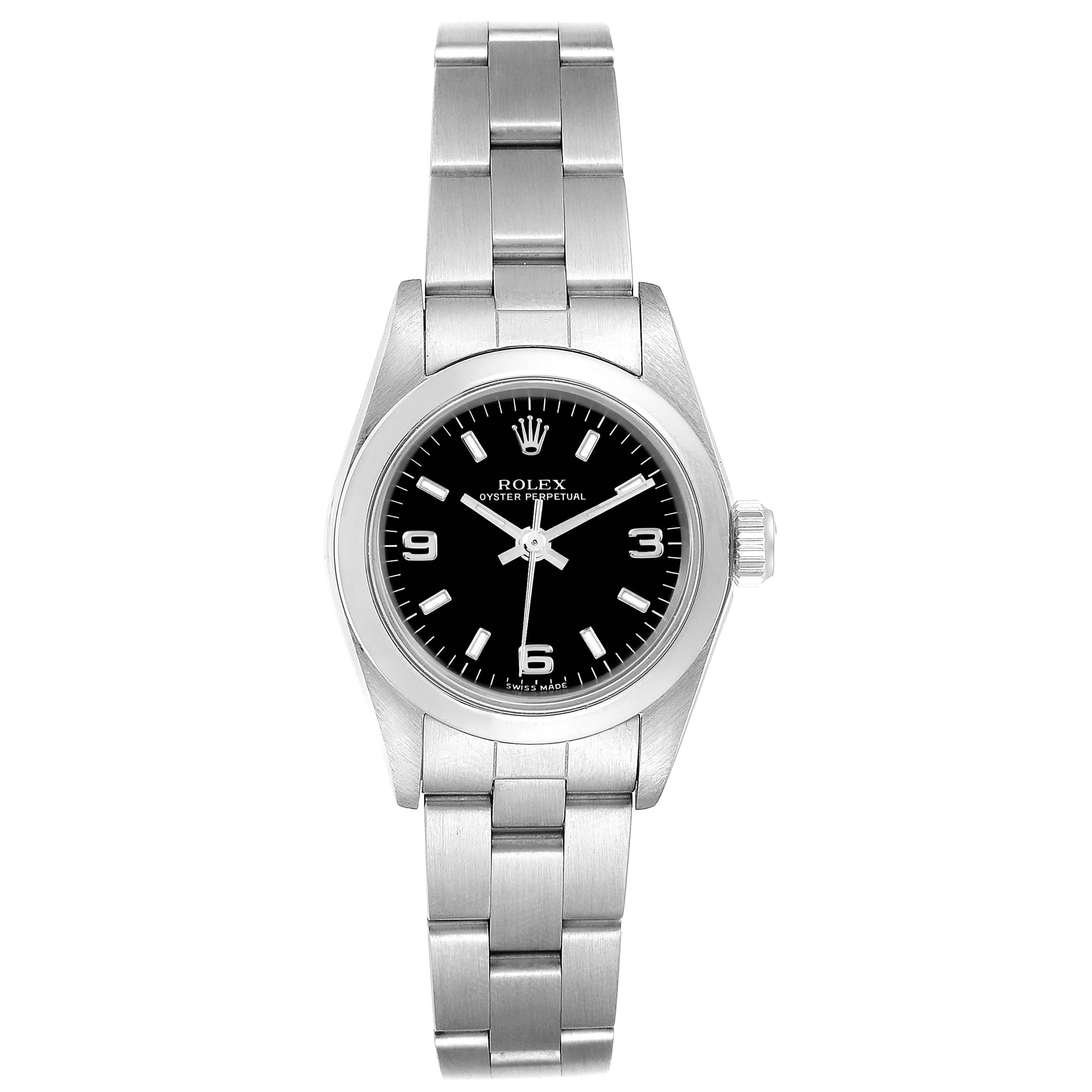 The image shows a front view of a Rolex Oyster Perpetual 76080 Women
s Stainless Steel Black Dial 76080 Women
s Stainless Steel Black Dial watch, focusing on the dial, bezel, and bracelet.