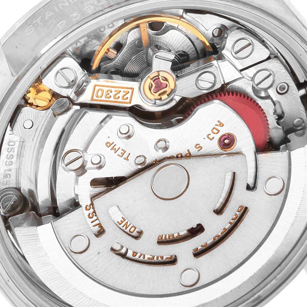 This image shows the internal mechanism of a Rolex Oyster Perpetual 76080 Women
s Stainless Steel Black Dial 76080 Women
s Stainless Steel Black Dial watch, featuring its intricate automatic movement components.
