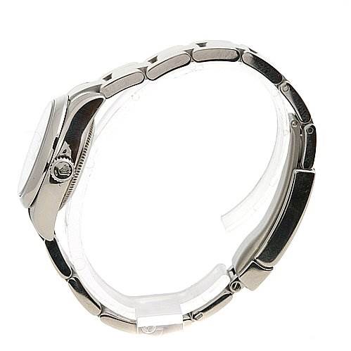 The image shows a side view of a Rolex Oyster Perpetual 0176200SAPSO Women's Stainless Steel Silver Dial 0176200SAPSO Women's Stainless Steel Silver Dial watch, focusing on its case, bezel, crown, and bracelet links.