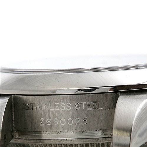 The image shows the side view of a Rolex Oyster Perpetual 0176200SAPSO Women's Stainless Steel Silver Dial 0176200SAPSO Women's Stainless Steel Silver Dial watch, highlighting the stainless steel engraving and the serial number.