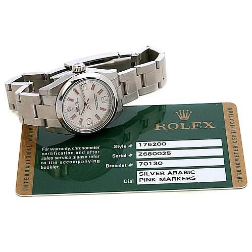 The image shows a side angle of the Rolex Oyster Perpetual 0176200SAPSO Women's Stainless Steel Silver Dial 0176200SAPSO Women's Stainless Steel Silver Dial watch along with its certification card detailing the model's specifications.