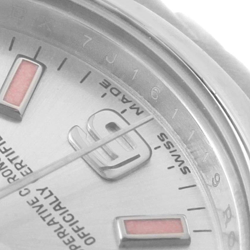 This close-up angle of the Rolex Oyster Perpetual 176200 Women
s Stainless Steel Silver Dial 176200 Women
s Stainless Steel Silver Dial watch shows the dial featuring the 9 o
clock marker, "SWISS MADE" text, and minute indices.