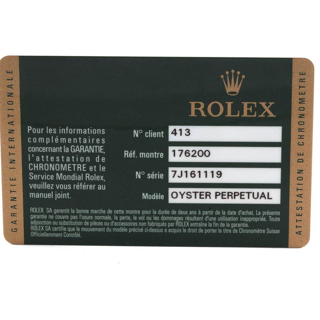 The image shows a Rolex warranty card for the Oyster Perpetual model, detailing client number, reference, and serial number.