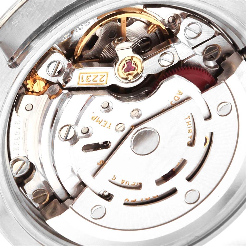 This image shows a close-up of the movement components inside a Rolex Oyster Perpetual 176200 Women
s Stainless Steel Silver Dial 176200 Women
s Stainless Steel Silver Dial watch.