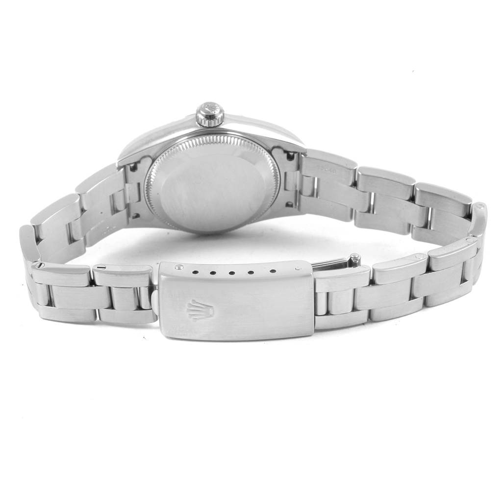 The image shows the Rolex Oyster Perpetual 76030 Women
s Stainless Steel Black Dial 76030 Women
s Stainless Steel Black Dial watch from the back, highlighting the bracelet and clasp.