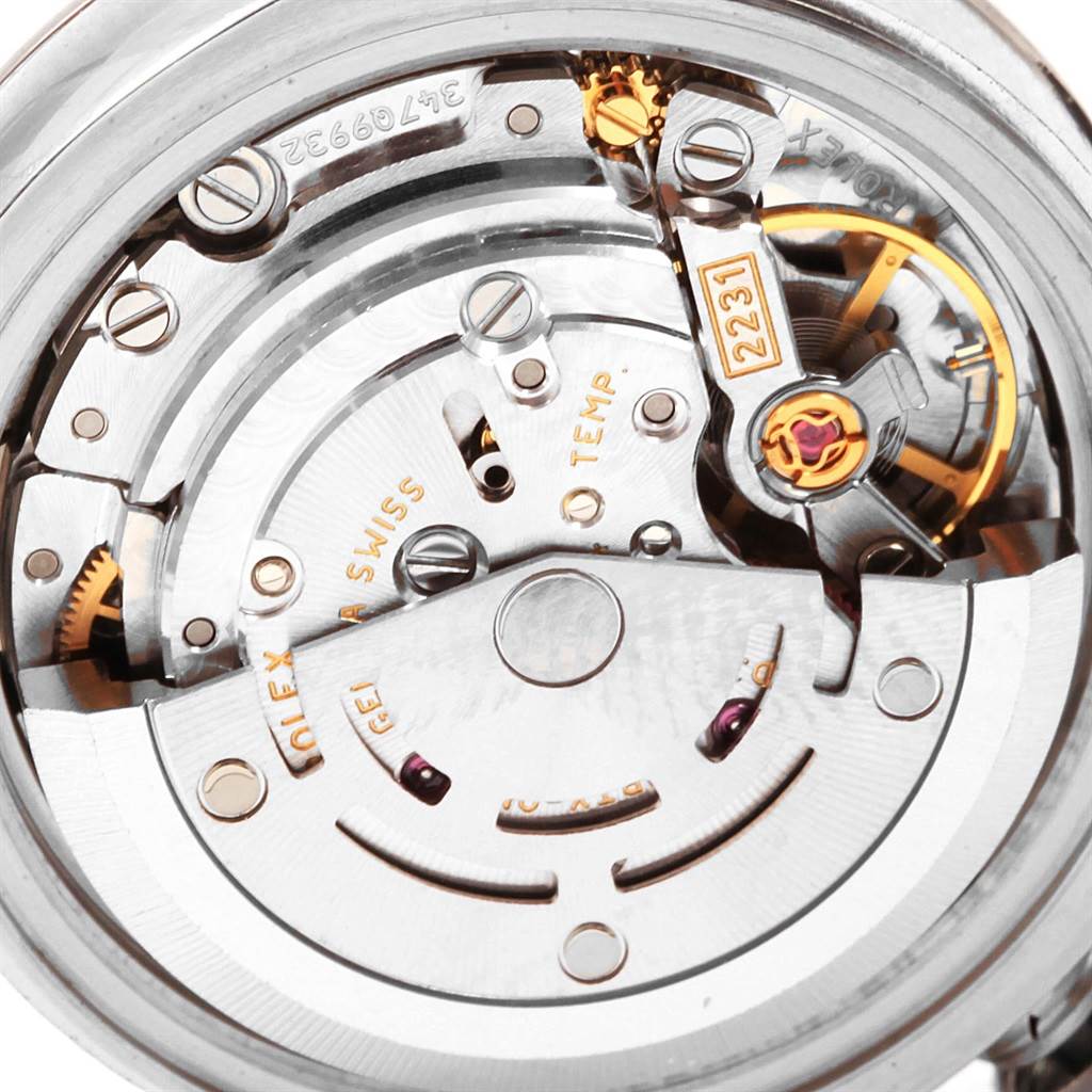 This image shows a close-up view of the internal movement mechanism of a Rolex Oyster Perpetual 176200 Women
s Stainless Steel Silver Dial 176200 Women
s Stainless Steel Silver Dial model watch.