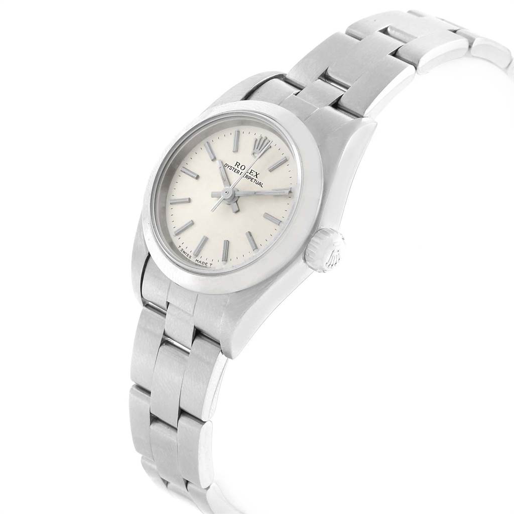 The image shows a Rolex Oyster Perpetual 67180 Women
s Stainless Steel Silver Dial 67180 Women
s Stainless Steel Silver Dial watch at a slight angle, highlighting the dial, case, crown, and part of the bracelet.