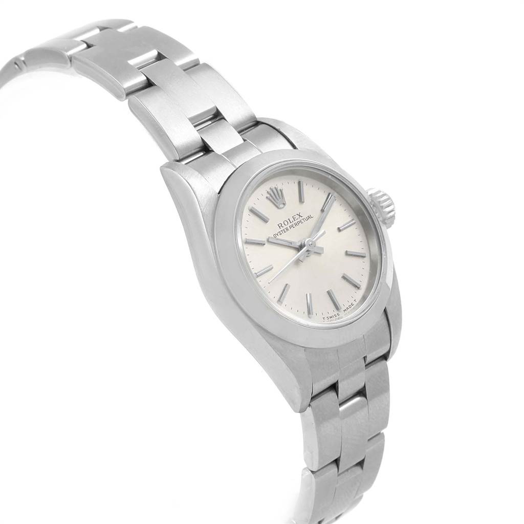 The Rolex Oyster Perpetual 67180 Women
s Stainless Steel Silver Dial 67180 Women
s Stainless Steel Silver Dial watch is shown from a side angle, displaying the face, bracelet, and crown.