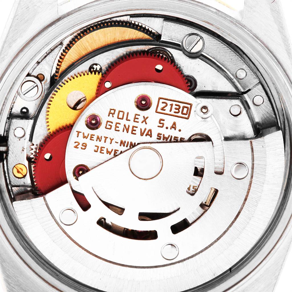 This image shows the back view of the movement mechanism of a Rolex Oyster Perpetual 67193 Women's Steel and Gold (two tone) Champagne Dial 67193 Women's Steel and Gold (two tone) Champagne Dial watch.