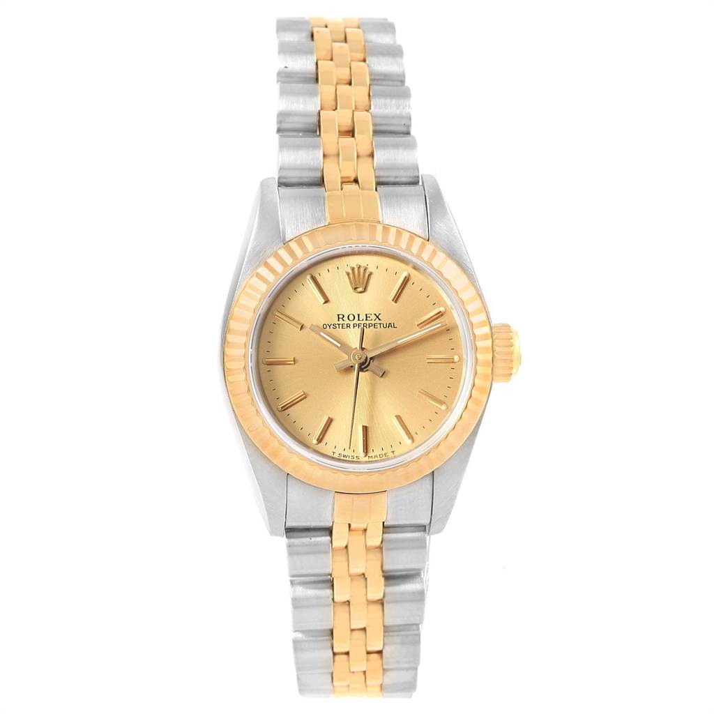The image shows a front view of a Rolex Oyster Perpetual 67193 Women's Steel and Gold (two tone) Champagne Dial 67193 Women's Steel and Gold (two tone) Champagne Dial watch, highlighting its gold dial, bezel, and two-tone metal bracelet.
