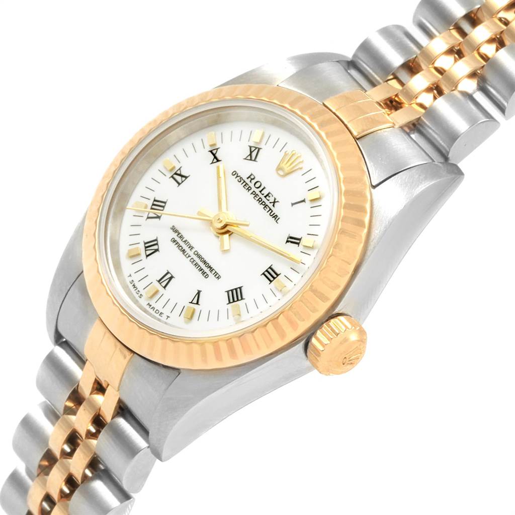 The Rolex Oyster Perpetual 76193 Women's Steel and Gold (two tone) White Dial 76193 Women's Steel and Gold (two tone) White Dial watch is shown at an angled view, highlighting the watch face, bezel, crown, and part of the bracelet.