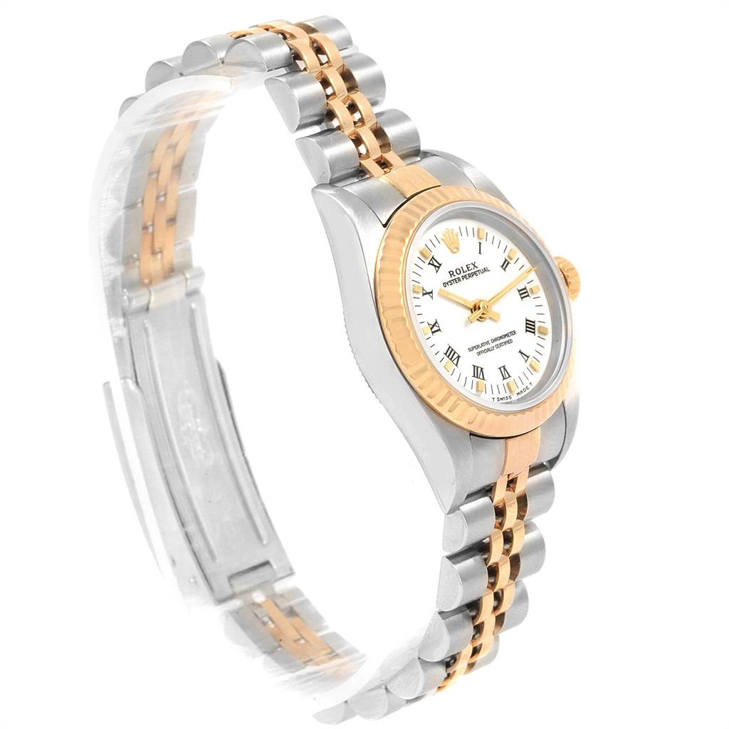 The Rolex Oyster Perpetual 76193 Women's Steel and Gold (two tone) White Dial 76193 Women's Steel and Gold (two tone) White Dial watch is shown at a three-quarter angle, displaying the bracelet, dial, and fluted bezel.