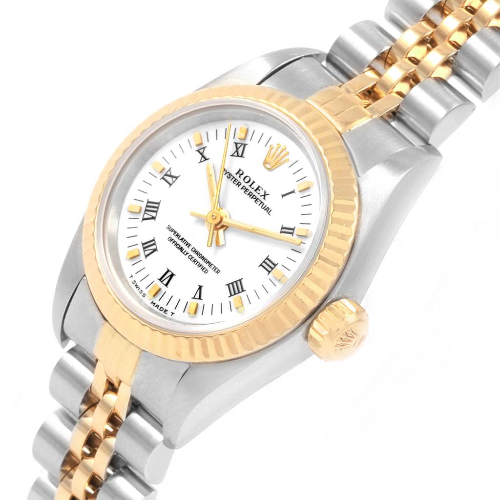 This image shows a close-up of the Rolex Oyster Perpetual 67193 Women's Steel and Gold (two tone) White Dial 67193 Women's Steel and Gold (two tone) White Dial watch, displaying the face, bezel, and part of the bracelet.