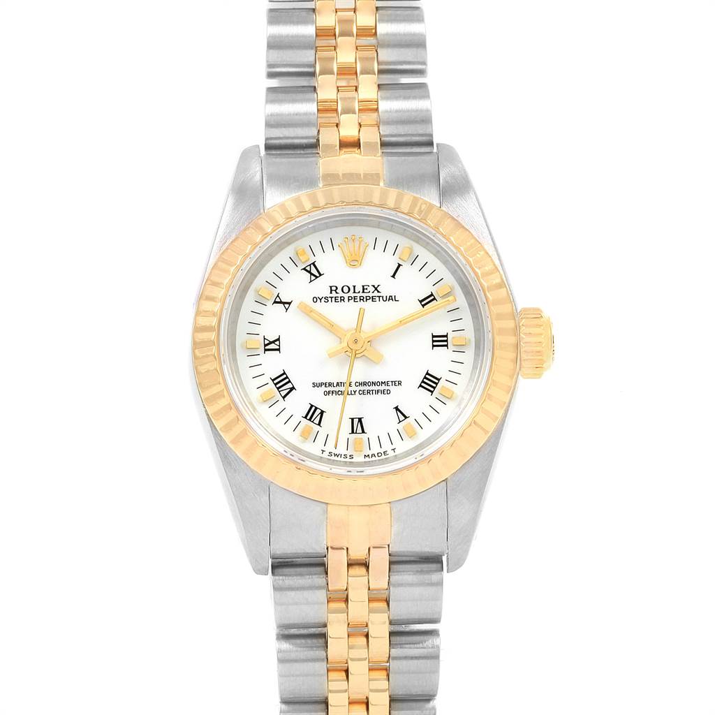 This image shows a front view of a Rolex Oyster Perpetual 67193 Women's Steel and Gold (two tone) White Dial 67193 Women's Steel and Gold (two tone) White Dial watch with a gold and silver bracelet and a white dial.