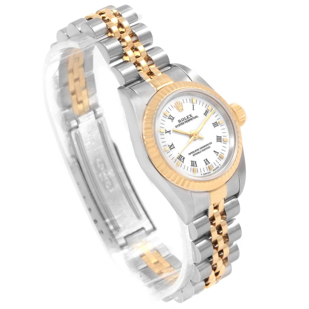 This image shows a Rolex Oyster Perpetual 67193 Women's Steel and Gold (two tone) White Dial 67193 Women's Steel and Gold (two tone) White Dial watch from a three-quarter angle, highlighting its gold and silver bracelet and white dial.