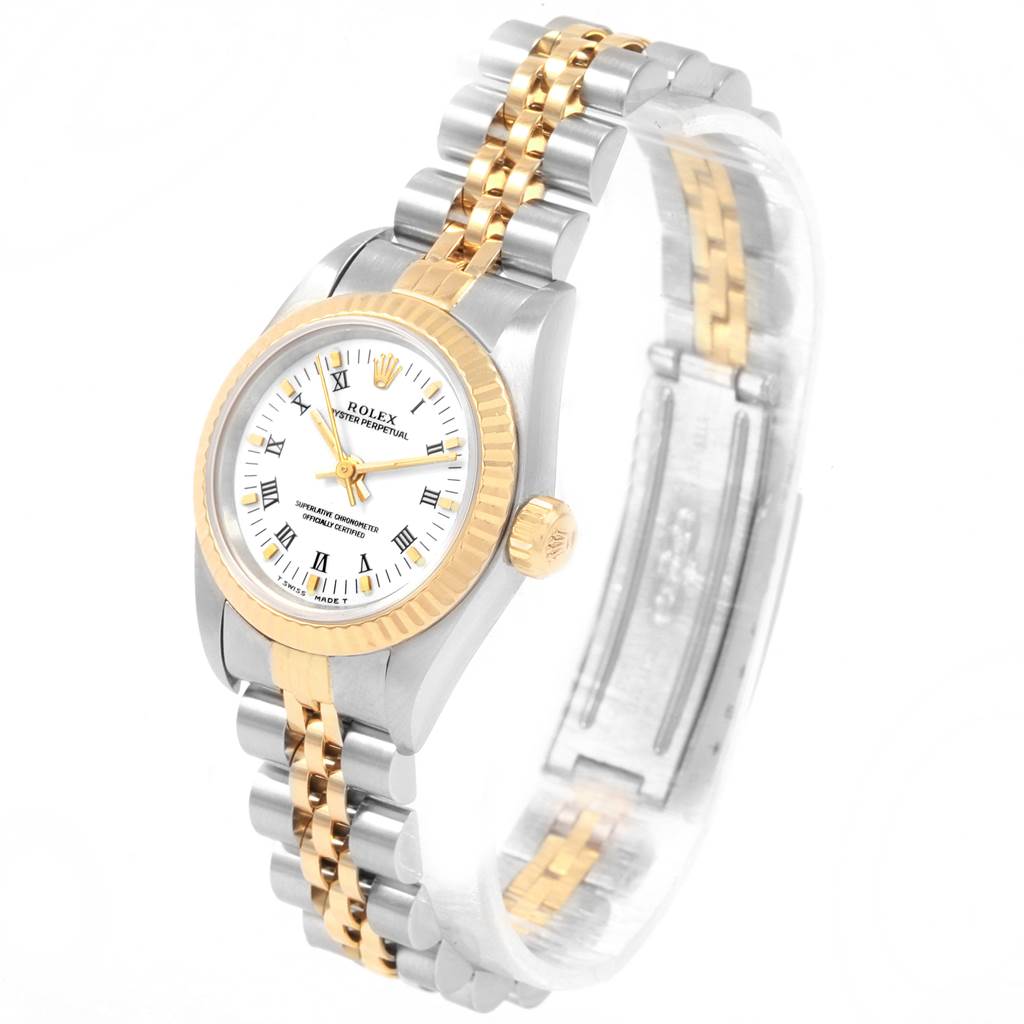 The image displays a Rolex Oyster Perpetual 67193 Women's Steel and Gold (two tone) White Dial 67193 Women's Steel and Gold (two tone) White Dial watch at an angled view, showing its dial, bezel, crown, and bracelet.