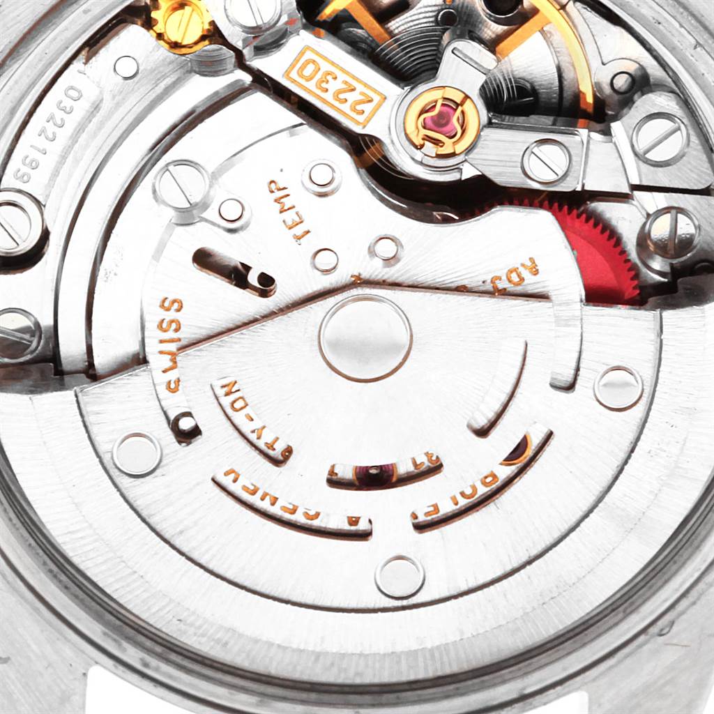 This image shows the intricate internal movement and components of the Rolex Oyster Perpetual 76080 Women
s Stainless Steel Black Dial 76080 Women
s Stainless Steel Black Dial watch.
