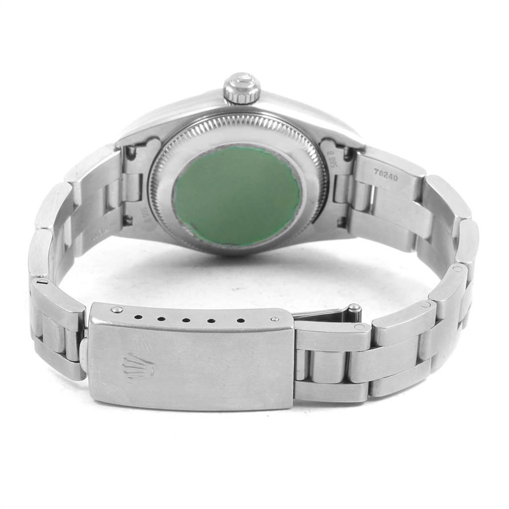 The image shows the back view of a Rolex Oyster Perpetual 76080 Women
s Stainless Steel Black Dial 76080 Women
s Stainless Steel Black Dial watch, highlighting the case back and bracelet clasp.