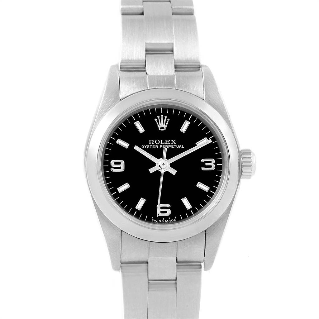 The Rolex Oyster Perpetual 76080 Women
s Stainless Steel Black Dial 76080 Women
s Stainless Steel Black Dial watch is shown from a top-down angle, displaying the face, bezel, and part of the bracelet.
