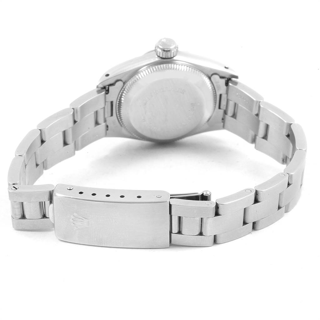 This image shows the back case and clasp of a Rolex Oyster Perpetual 67230 Women
s Stainless Steel Blue Dial 67230 Women
s Stainless Steel Blue Dial watch, displaying its stainless steel bracelet.