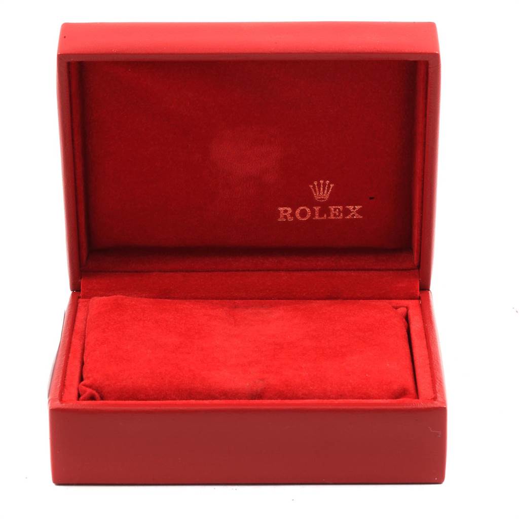 The image shows an open, red velvet Rolex box for the Oyster Perpetual model, viewed from the front.